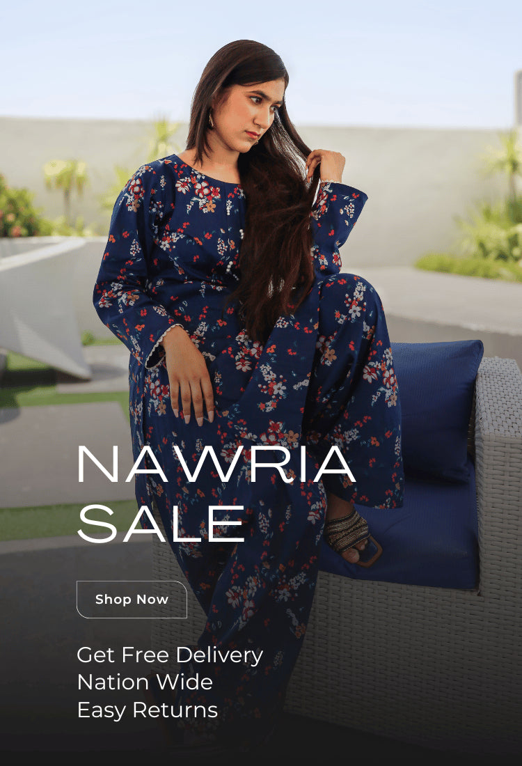 Woman in a blue floral dress sitting on a couch with promotional text for NAWRIA sale.