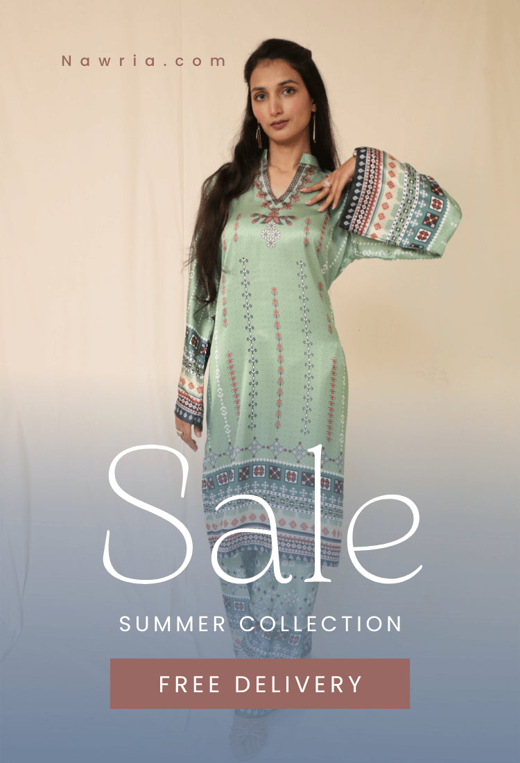 Woman wearing a light green dress with a patterned dupatta, standing against a gradient background with 'Nawria.com' branding.